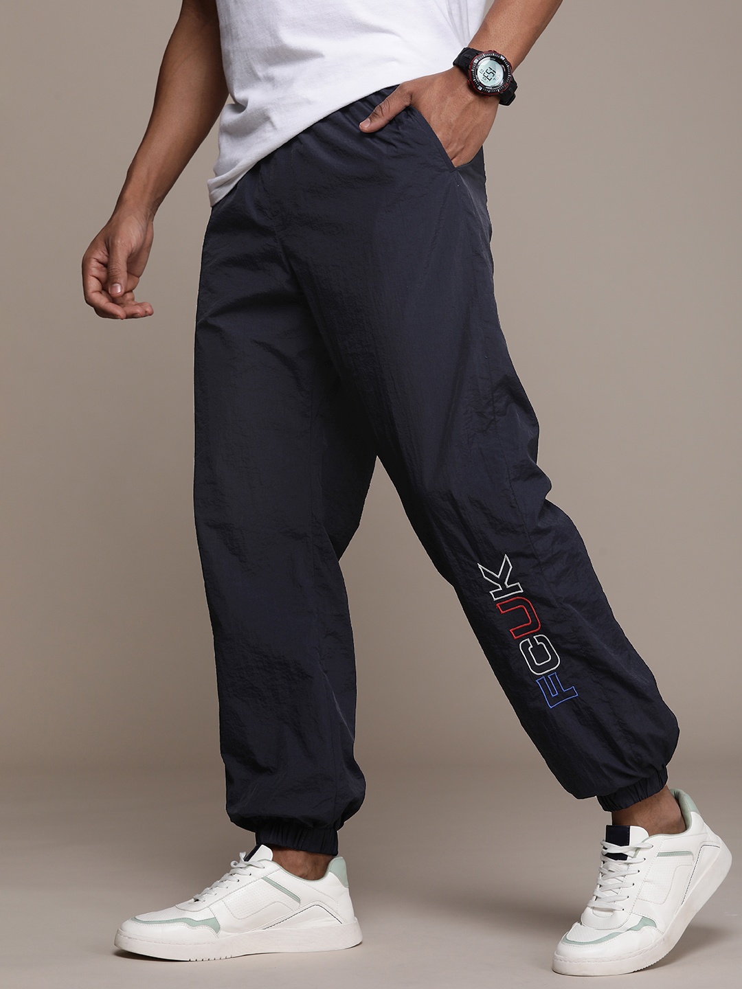 

FCUK Men Brand Logo Embroidered Mid-Rise Regular Joggers, Navy blue