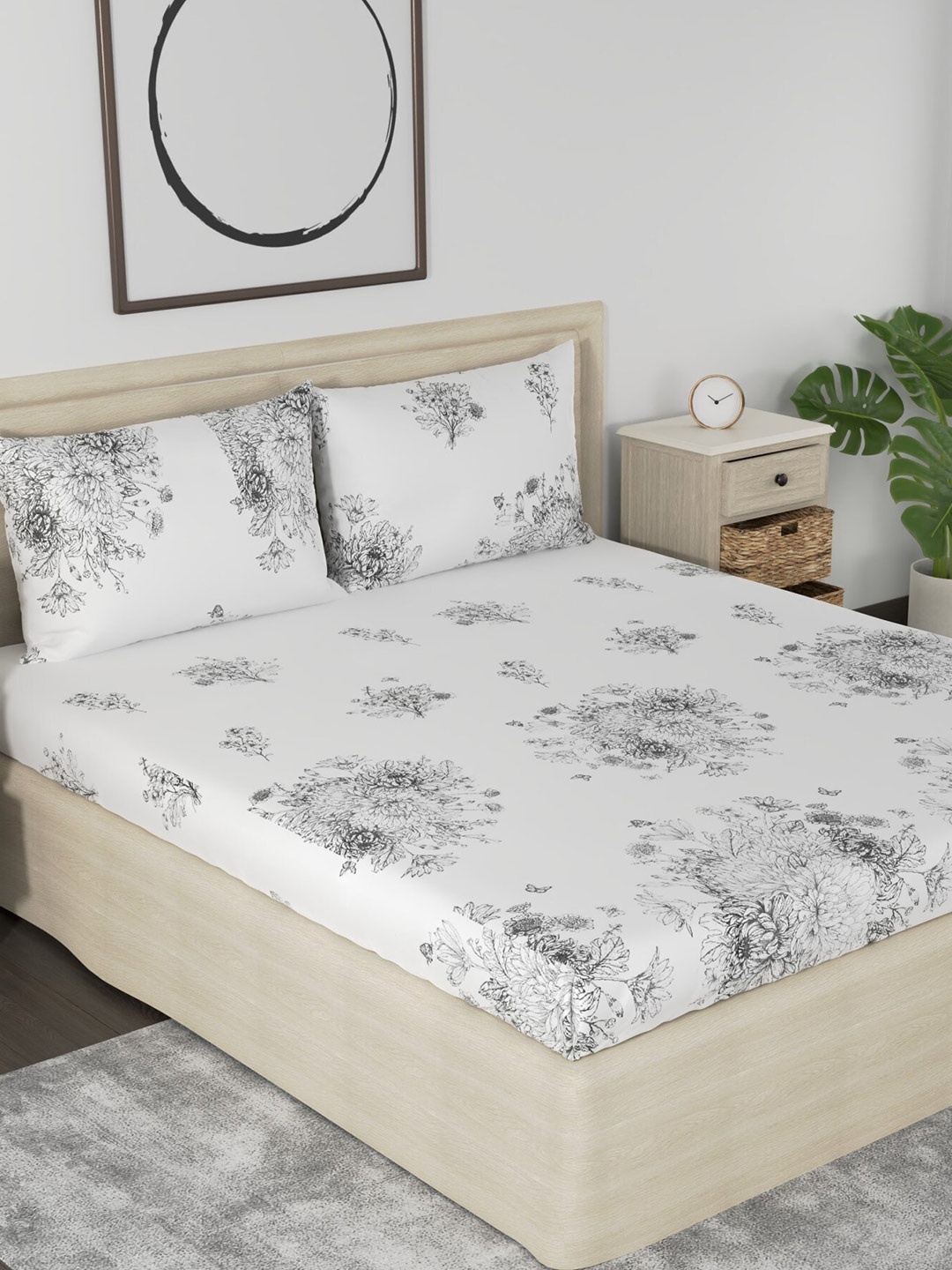 

Huesland Aspire White & Black Floral 186 TC Cotton King Bedsheet with 2 Pillow Covers