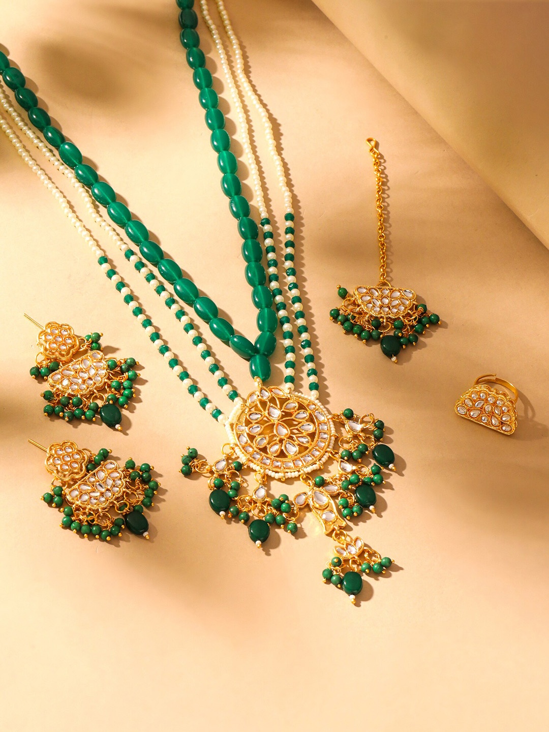 

Yellow Chimes Gold-Plated Kundan-Studded Jewellery Set With Maangtika & Finger Ring
