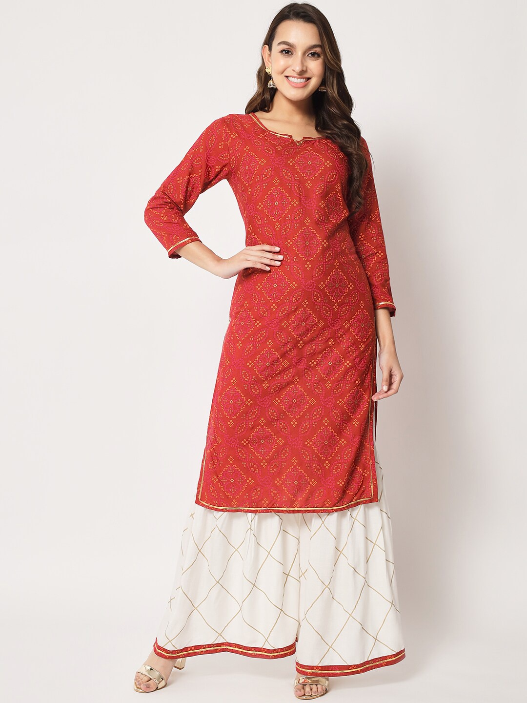 

SURHI Notched Neck Bandhani Printed Gotta Patti Kurta with Sharara, Red