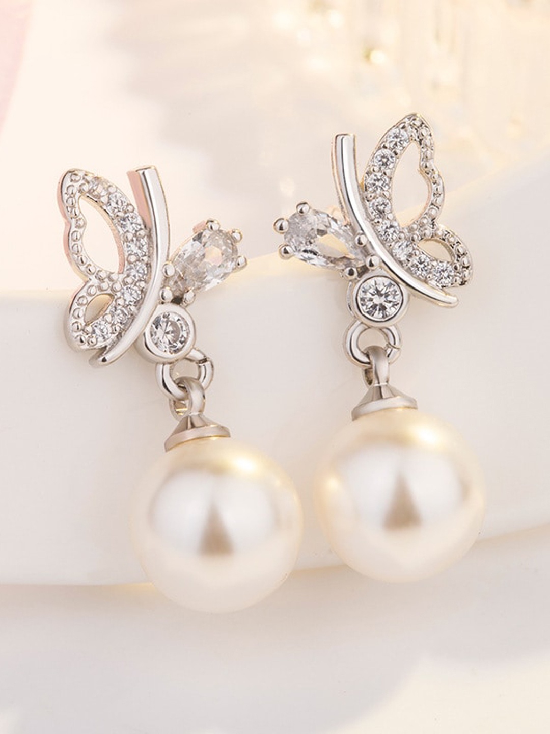 

MYKI Silver-Plated Butterfly Shaped Cubic Zirconia Studded Drop Earrings