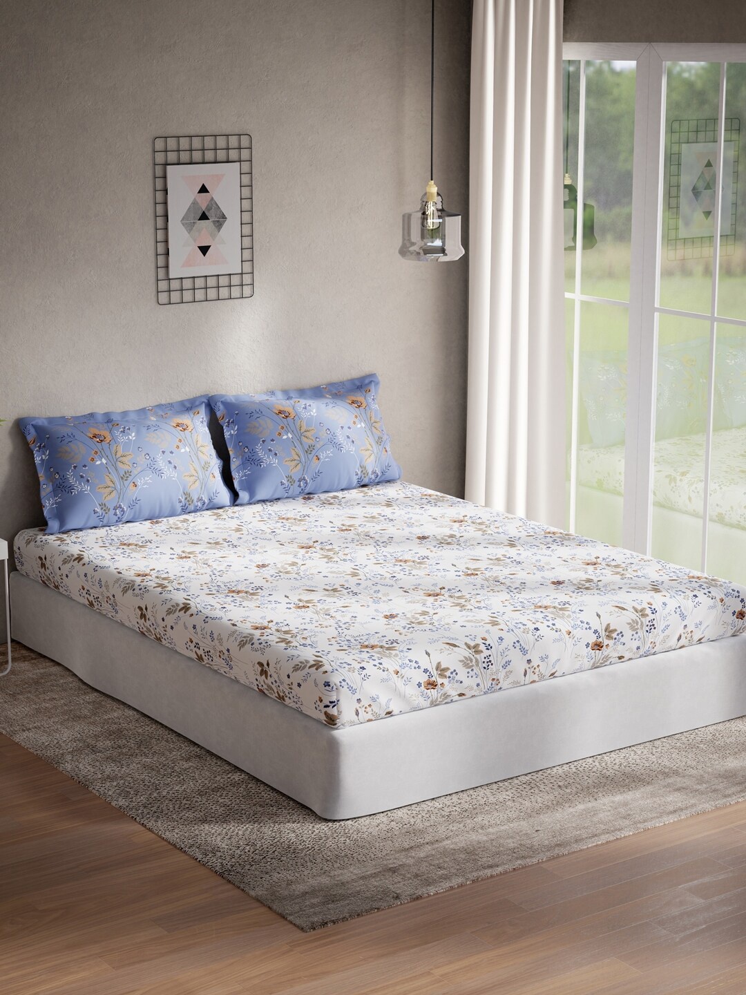 

DDecor White & Blue Floral 144 TC Cotton Queen Bedsheet with 2 Pillow Covers
