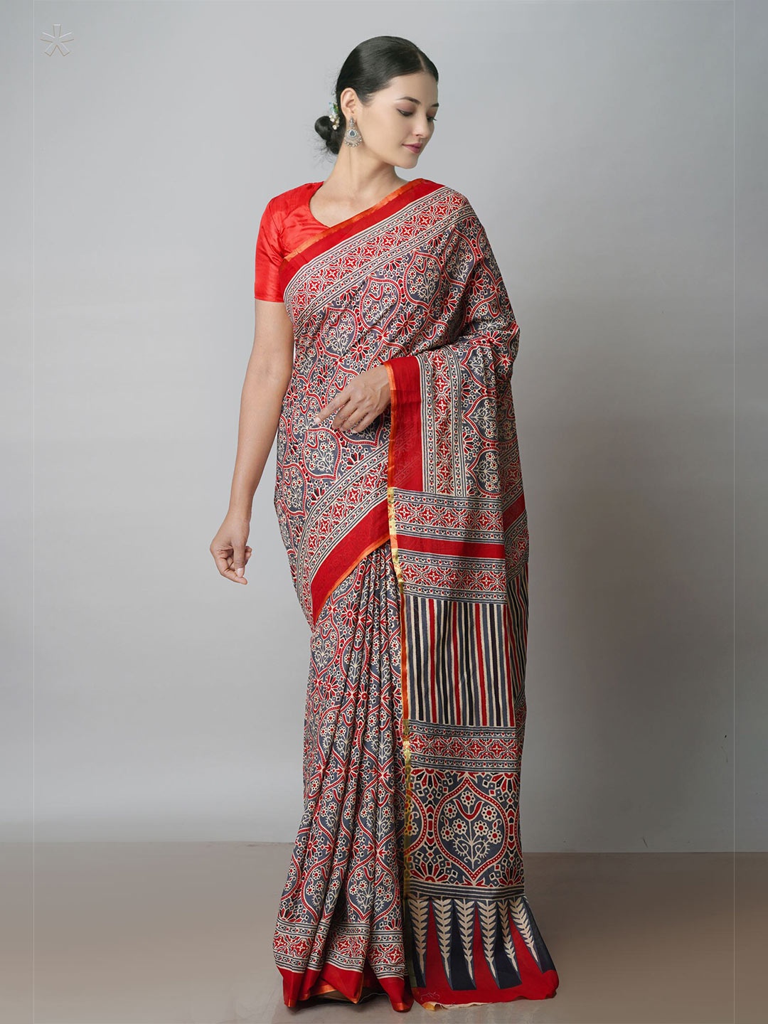 

Unnati Silks Grey & Red Ethnic Motifs Zari Silk Cotton Pure Ajrakh Chanderi Saree