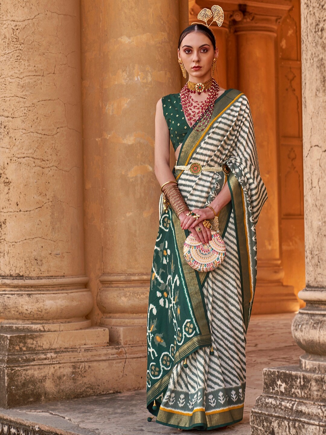 

Anouk Off White & Green Ethnic Motif Woven Design Zari Banarasi Saree