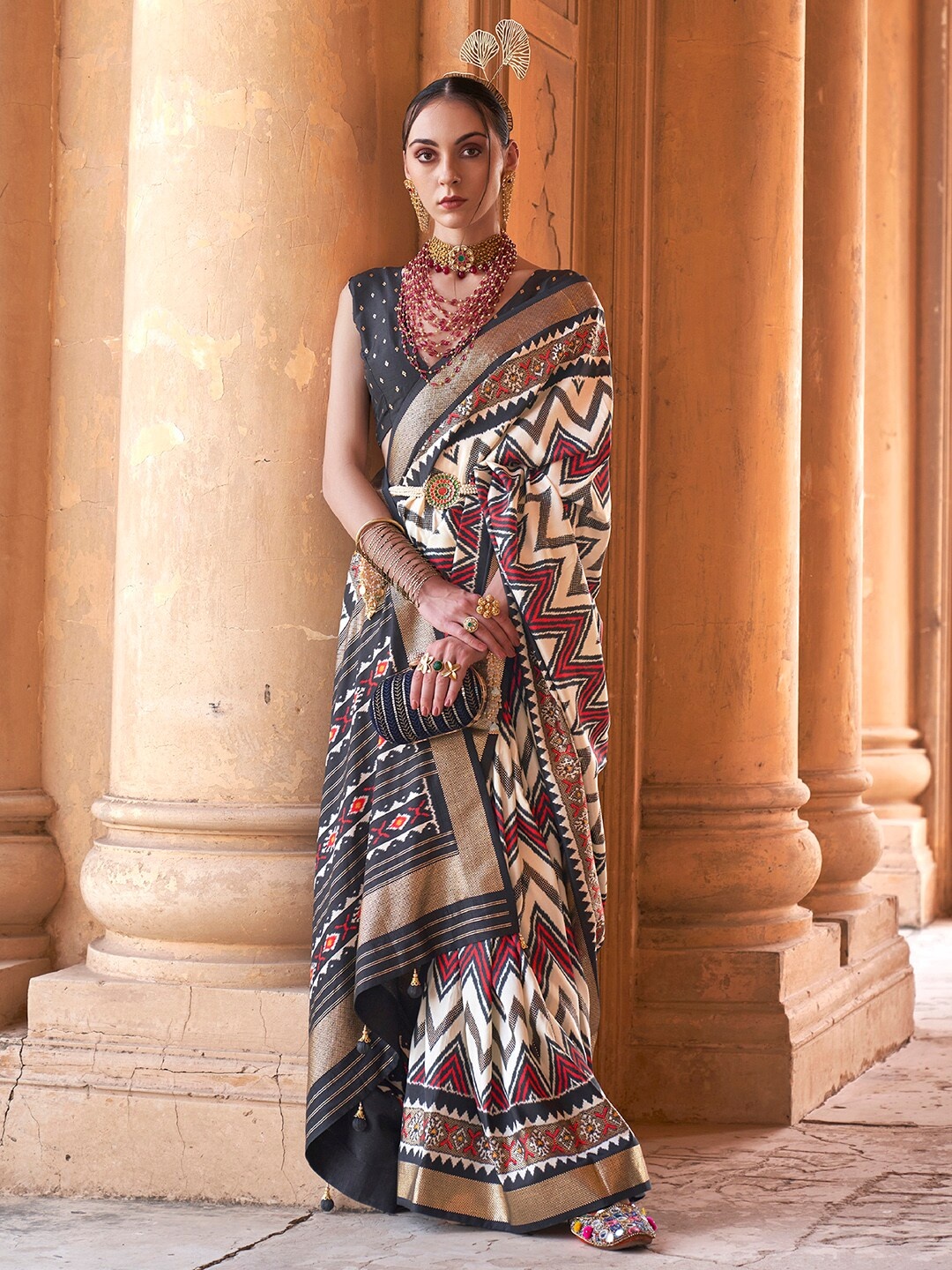 

Anouk Cream & Black Ethnic Motif Woven Design Zari Banarasi Saree