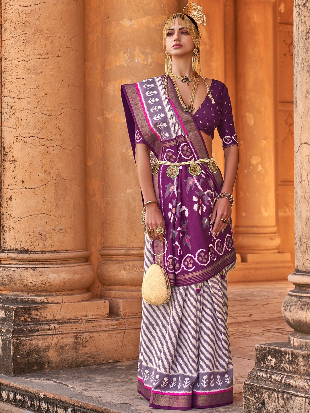 

Anouk Off White & Purple Striped Zari Banarasi Saree