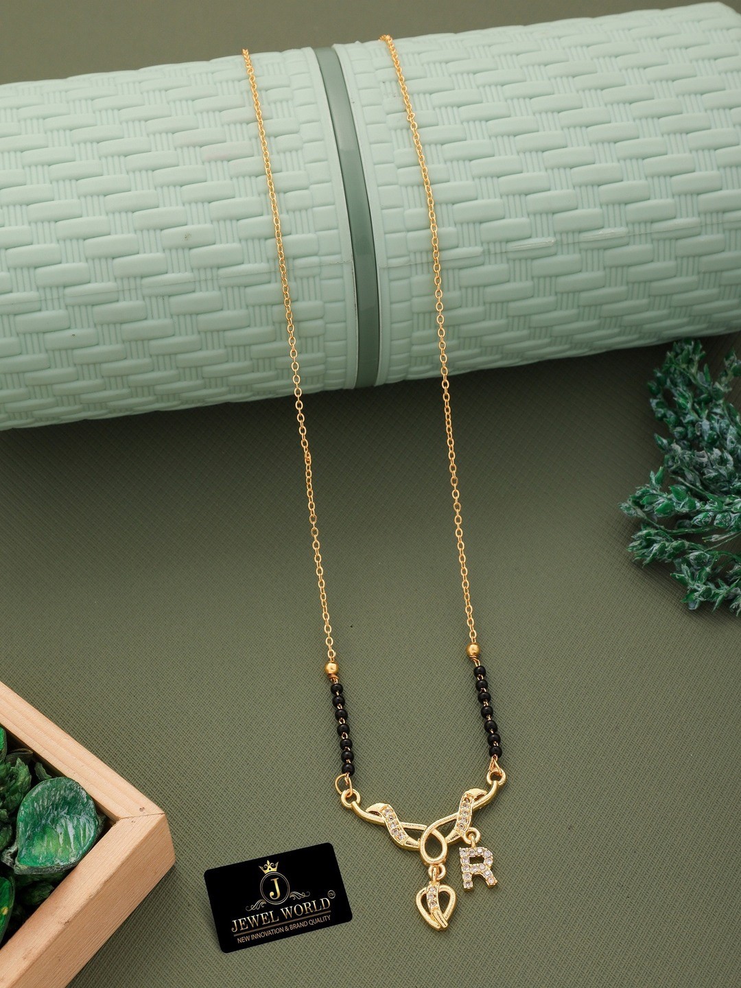 

JEWEL WORLD Gold-Plated Stone-Studded & Beaded Mangalsutra