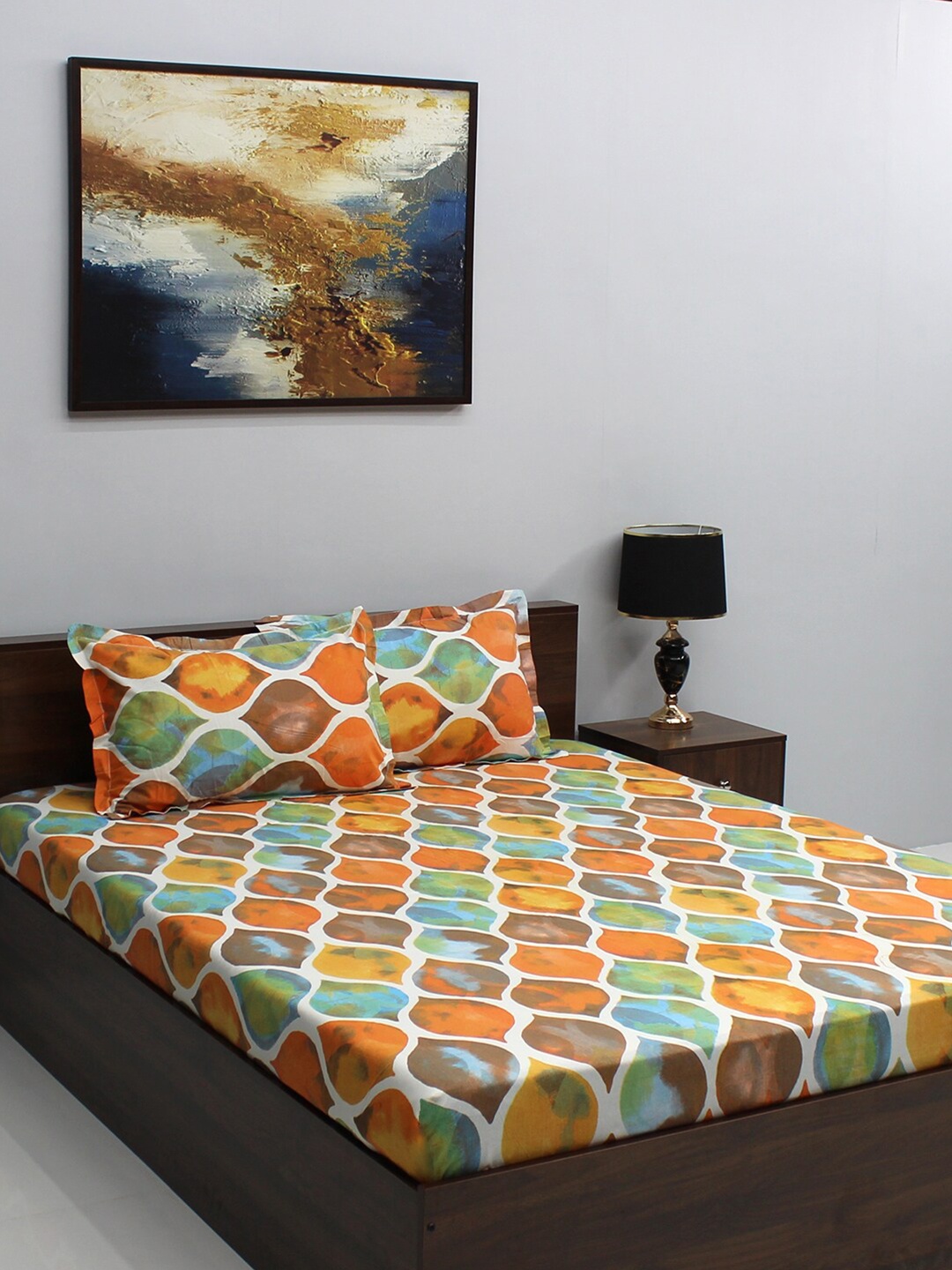 

BOMBAY DYEING Dream Lover Orange Printed 104 TC Cotton King Bedsheet & 2 Pillow Covers