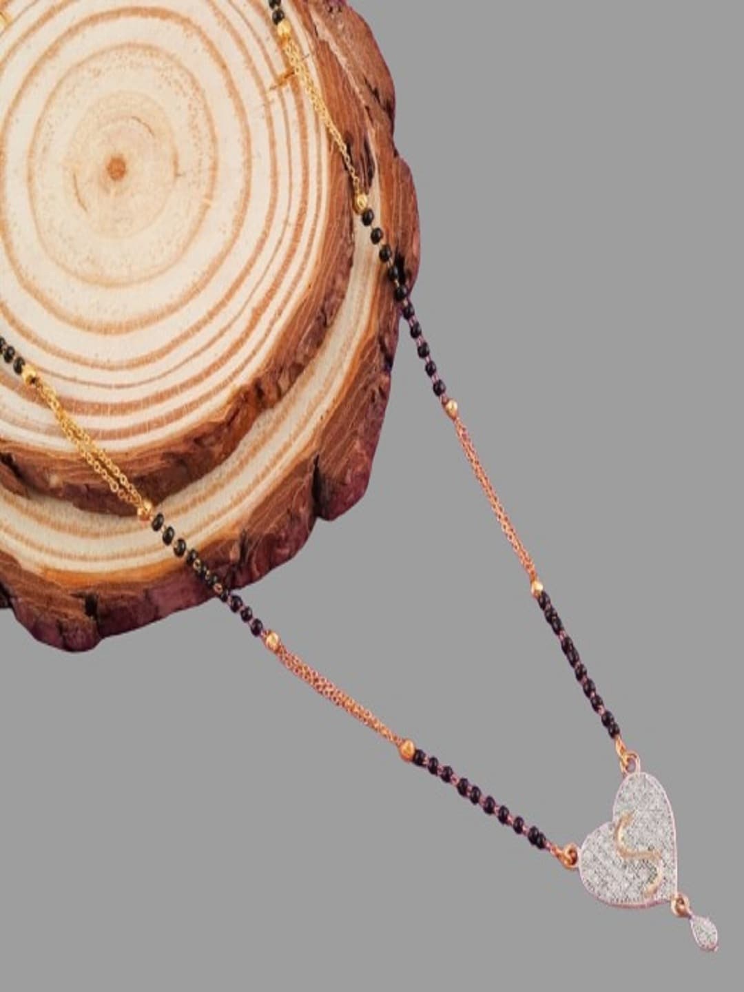 

JEWEL WORLD Gold-Plated Stone-Studded & Beaded Mangalsutra