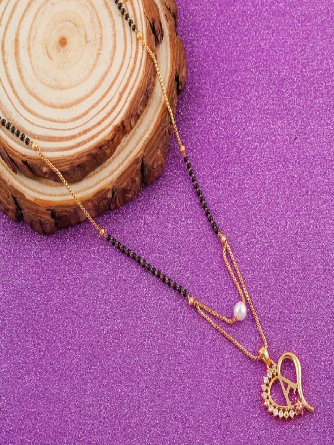 

JEWEL WORLD Gold-Plated Stone-Studded & Beaded Mangalsutra