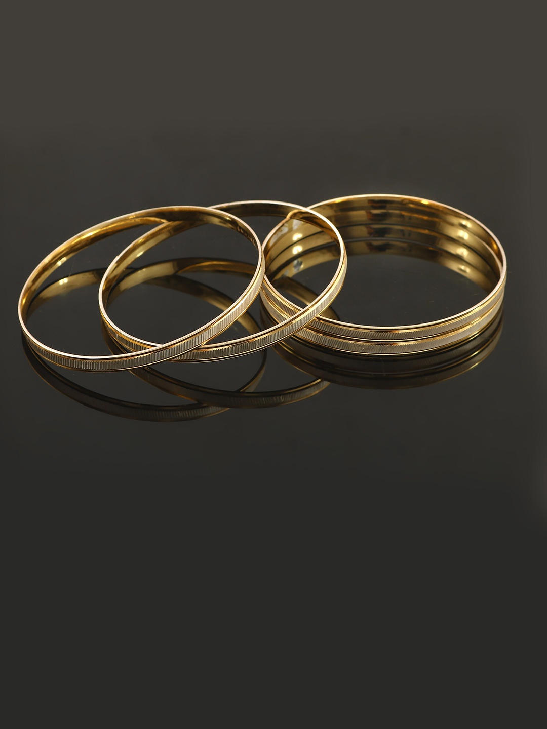 

Jewar Mandi Set Of 4 Gold-Plated Bangles