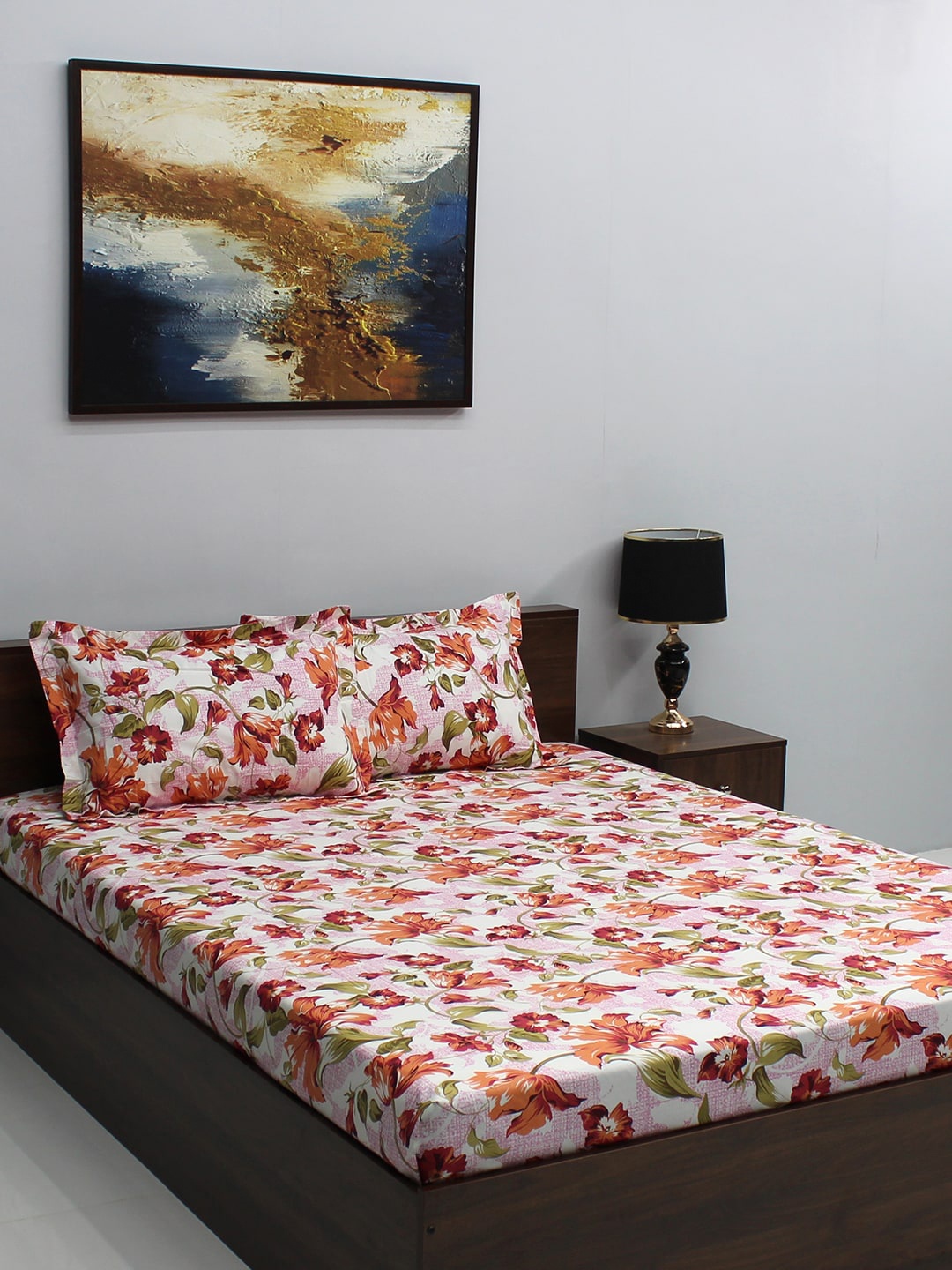 

BOMBAY DYEING Epigram White & Orange Cotton Floral 120 TC Queen Bedsheet & 2 Pillow Covers