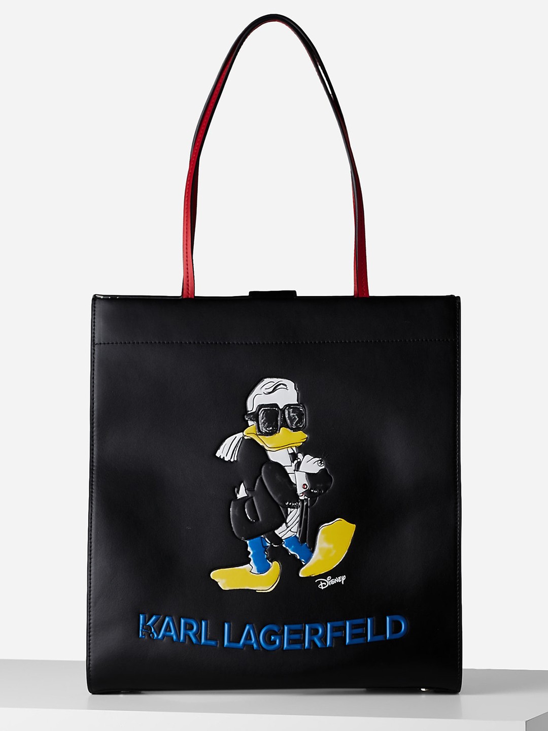 

Karl Lagerfeld Women Disney Printed PU Shopper Tote Bag with Applique, Black