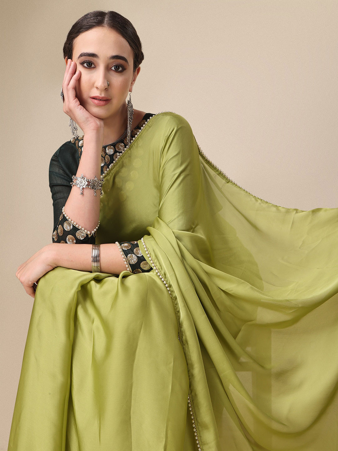 

Sangria Olive Green Satin Saree With Beads Embelished Border