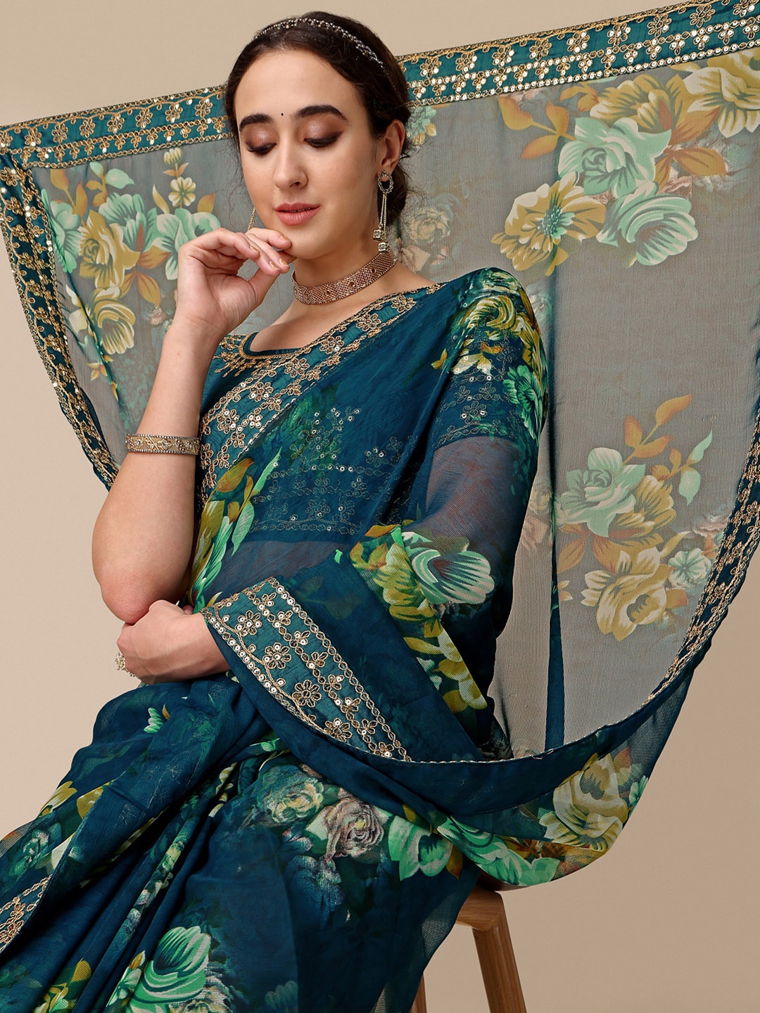 

Sangria Teal Floral Printed Embellished Organza Saree