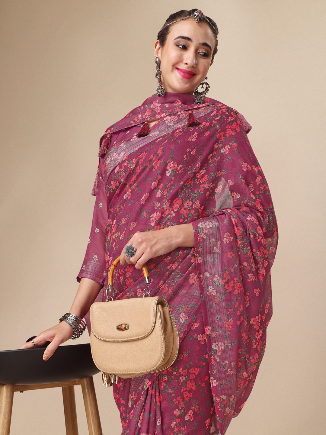 

Sangria Burgundy Floral Printed Embellished Pure Linen Saree