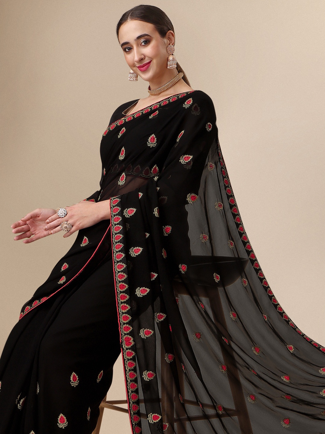 

Sangria Black Ethnic Motif Embroidered Pure Georgette Saree
