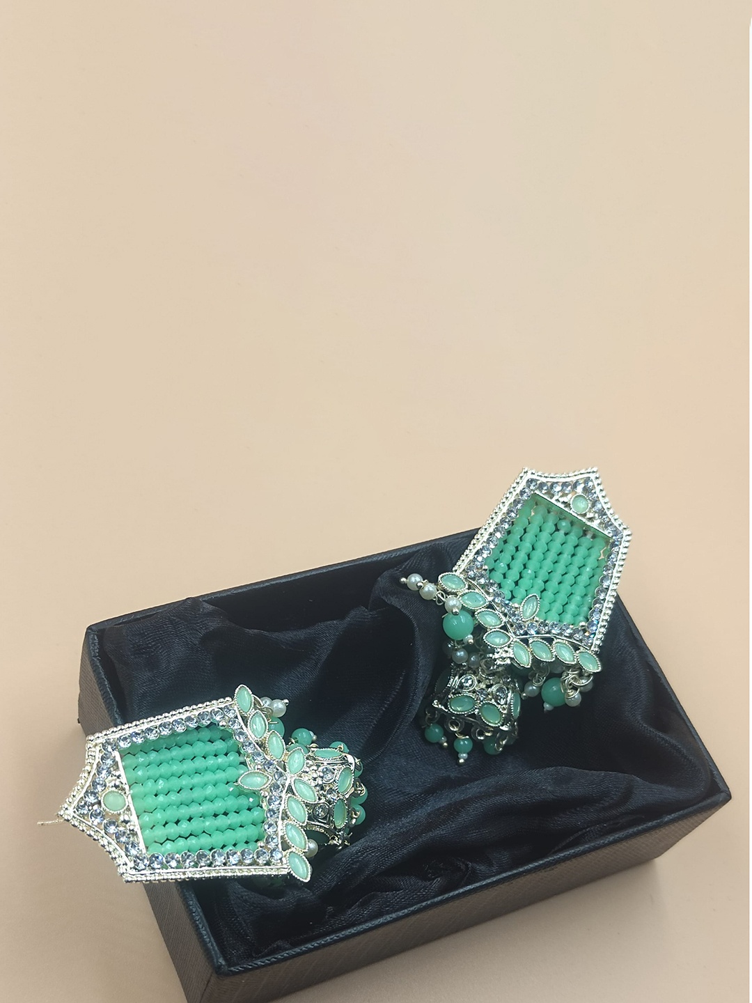 

Rhymee Gold-Plated Contemporary Kundan Studded And Beaded Jhumkas