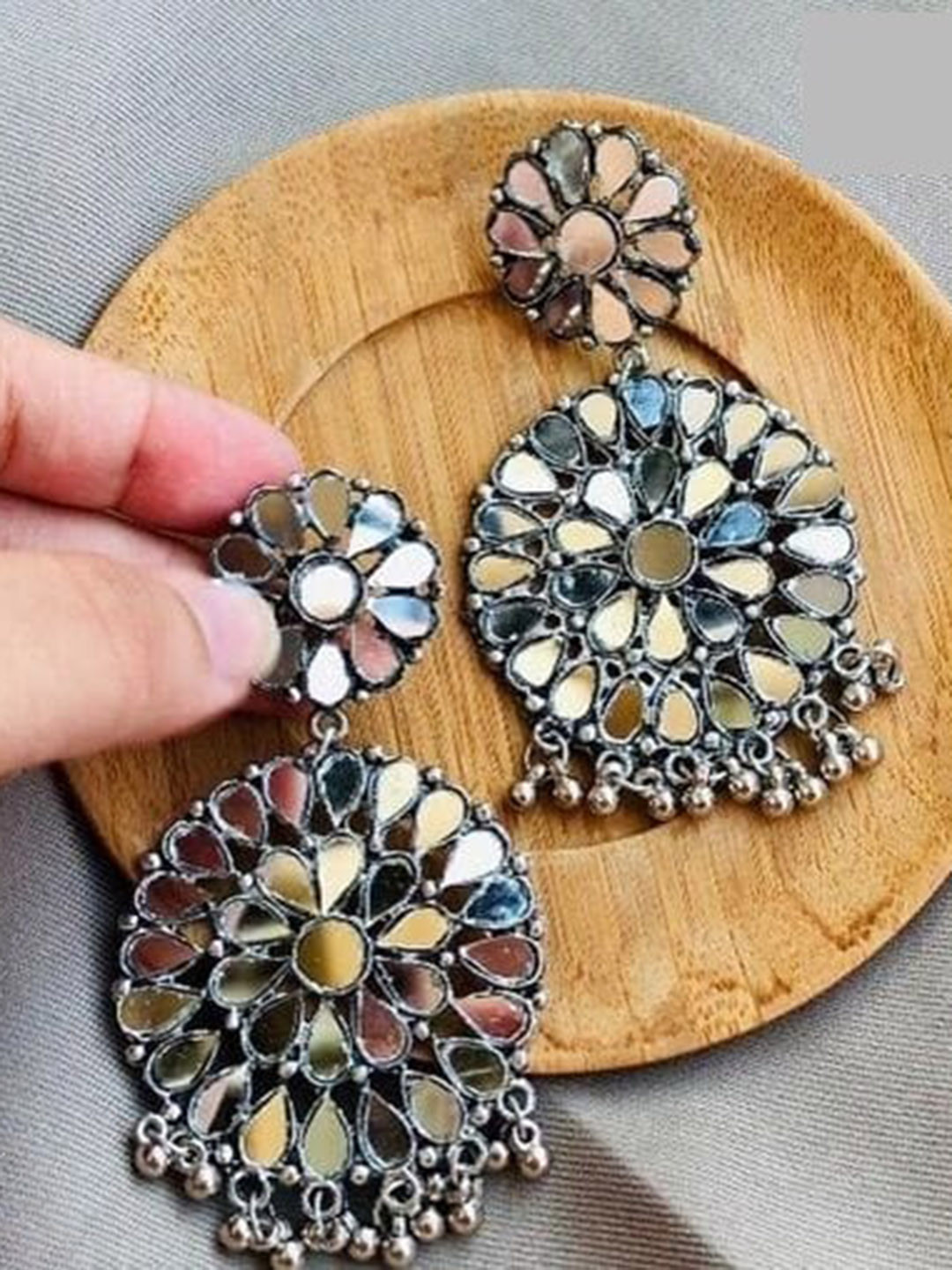 

Samridhi DC Silver-Plated Oxidised Contemporary Drop Earrings