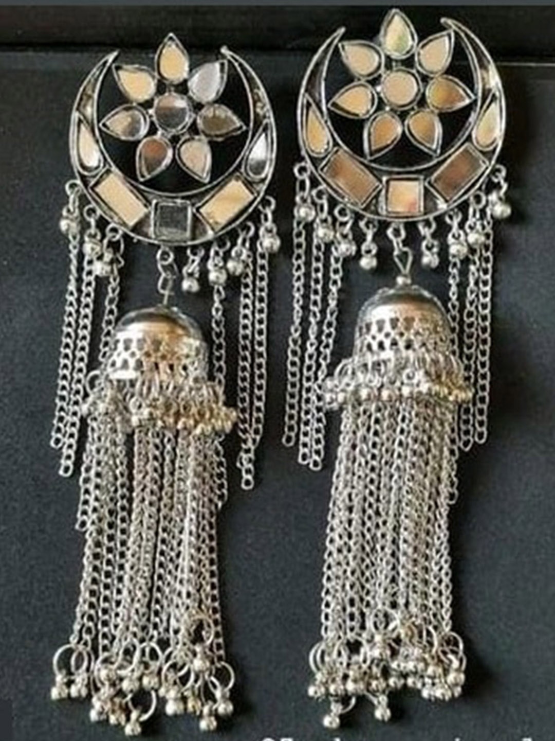 

Samridhi DC Silver-Plated Contemporary Oxidised Jhumkas