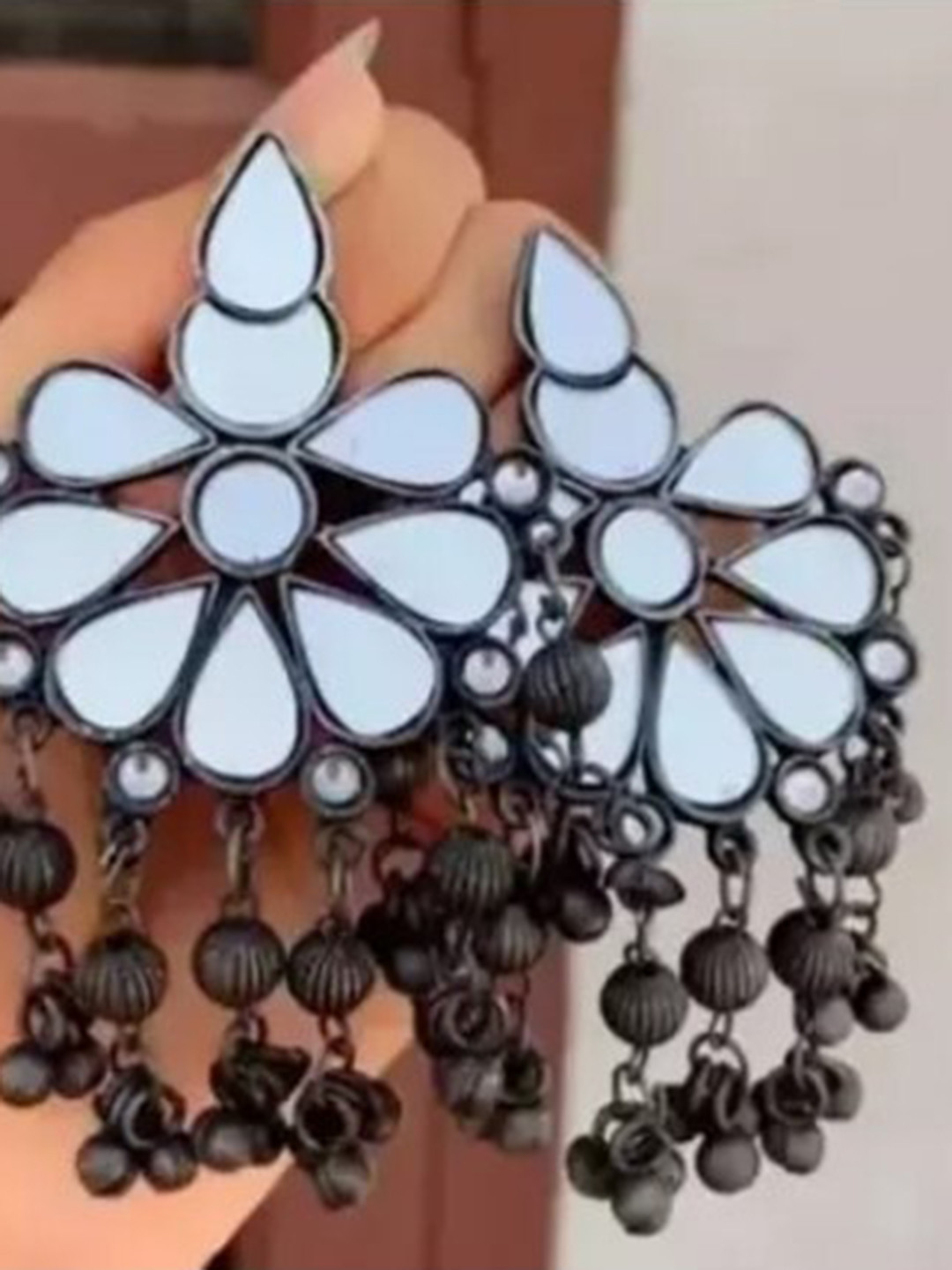 

Samridhi DC Silver-Plated Oxidised Contemporary Drop Earrings