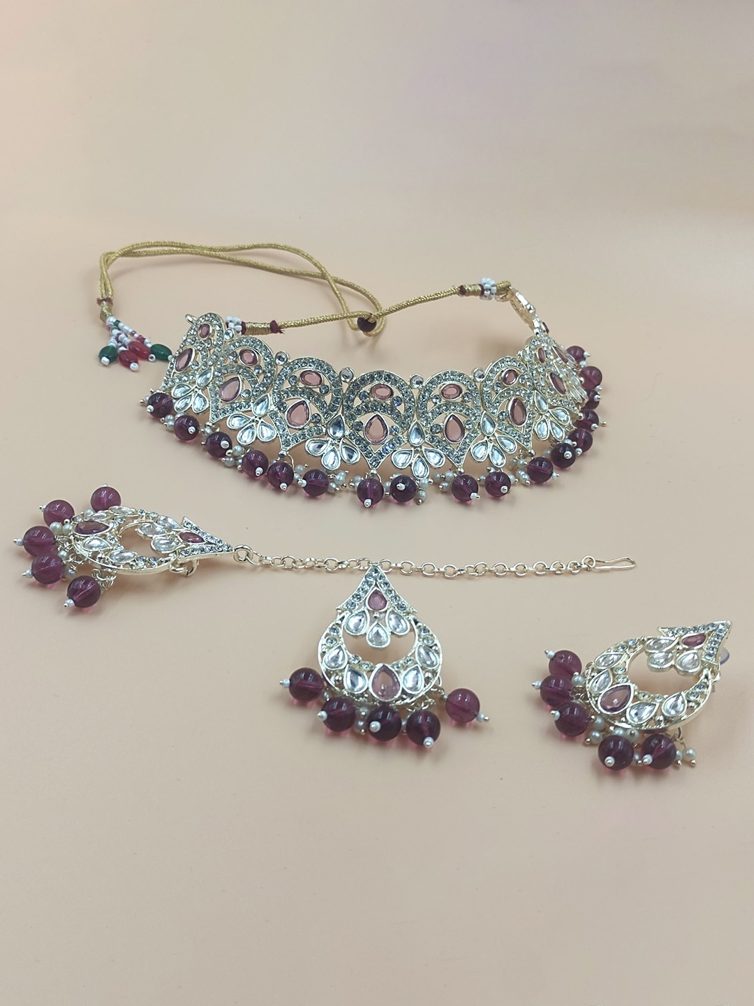 

Rhymee Gold-Plated Kundan Studded Choker Jewellery Set