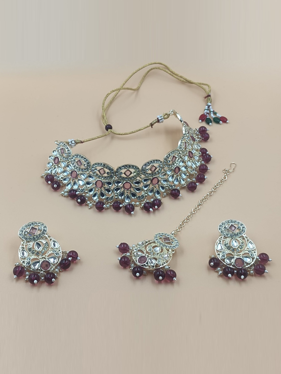 

Rhymee Gold Plated Kundan Studded Choker Jewellery Set