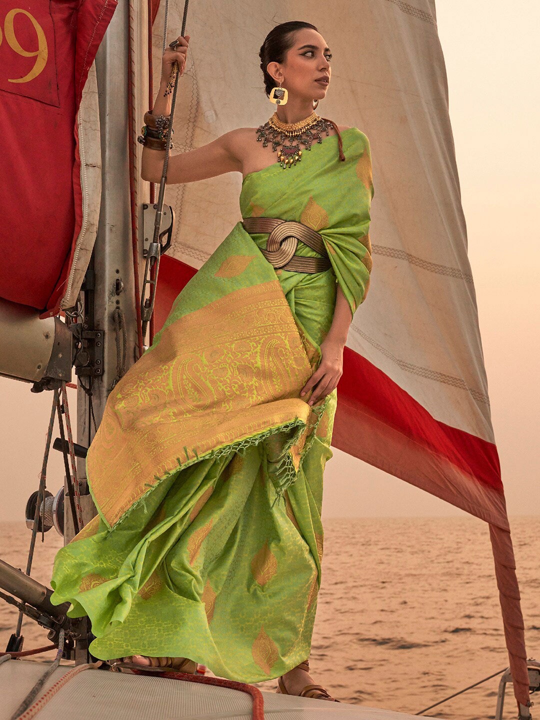 

Mitera Lime Green & Gold-Toned Ethnic Motifs Woven Design Zari Banarasi Saree