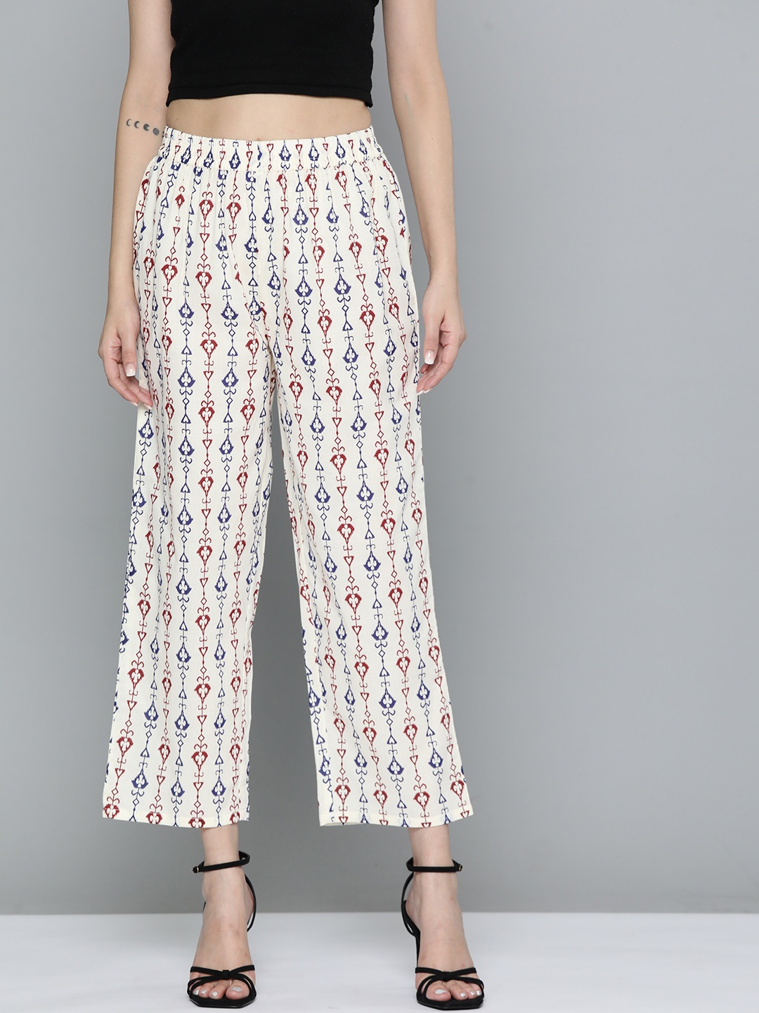 

HERE&NOW Women Pure Cotton Ethnic Motifs Printed Flared Cropped Palazzos, Cream