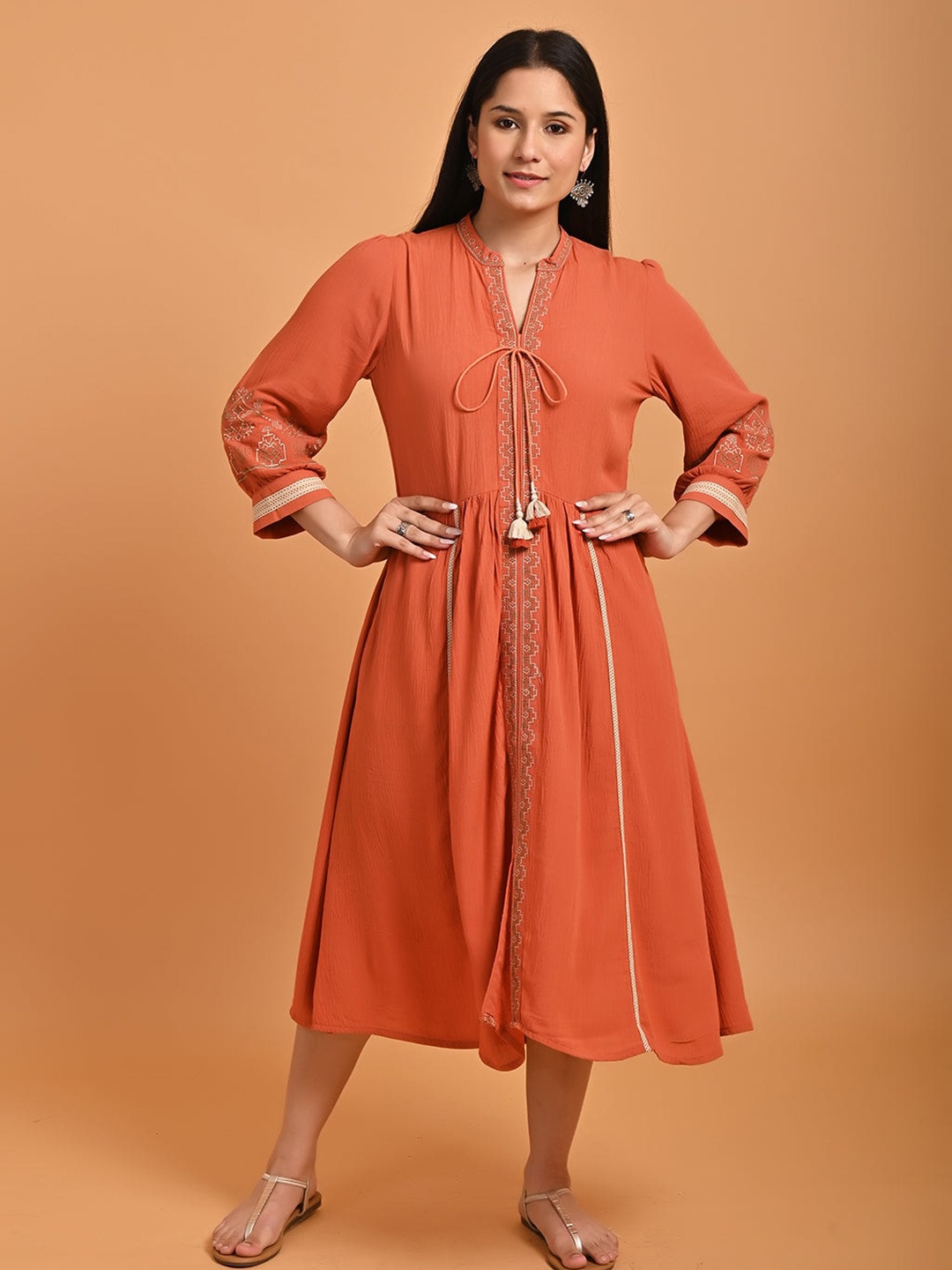 

Lakshita Ethnic Motif Embroidered Tie-Up Neck A-Line Midi Ethnic Dress, Orange
