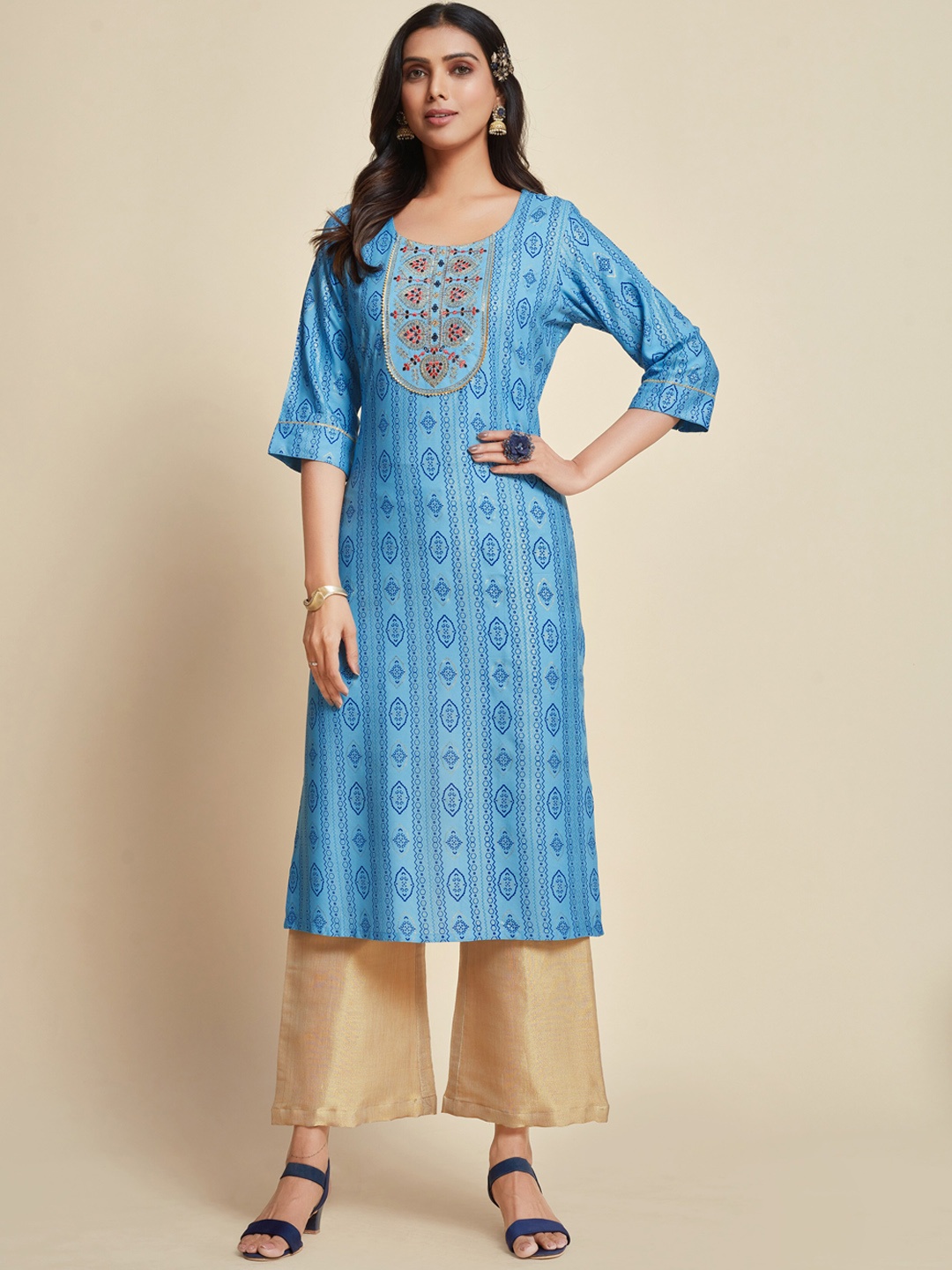 

Ishin Turquoise Blue Ethnic Motifs Printed Thread Work Gotta Patti Kurta