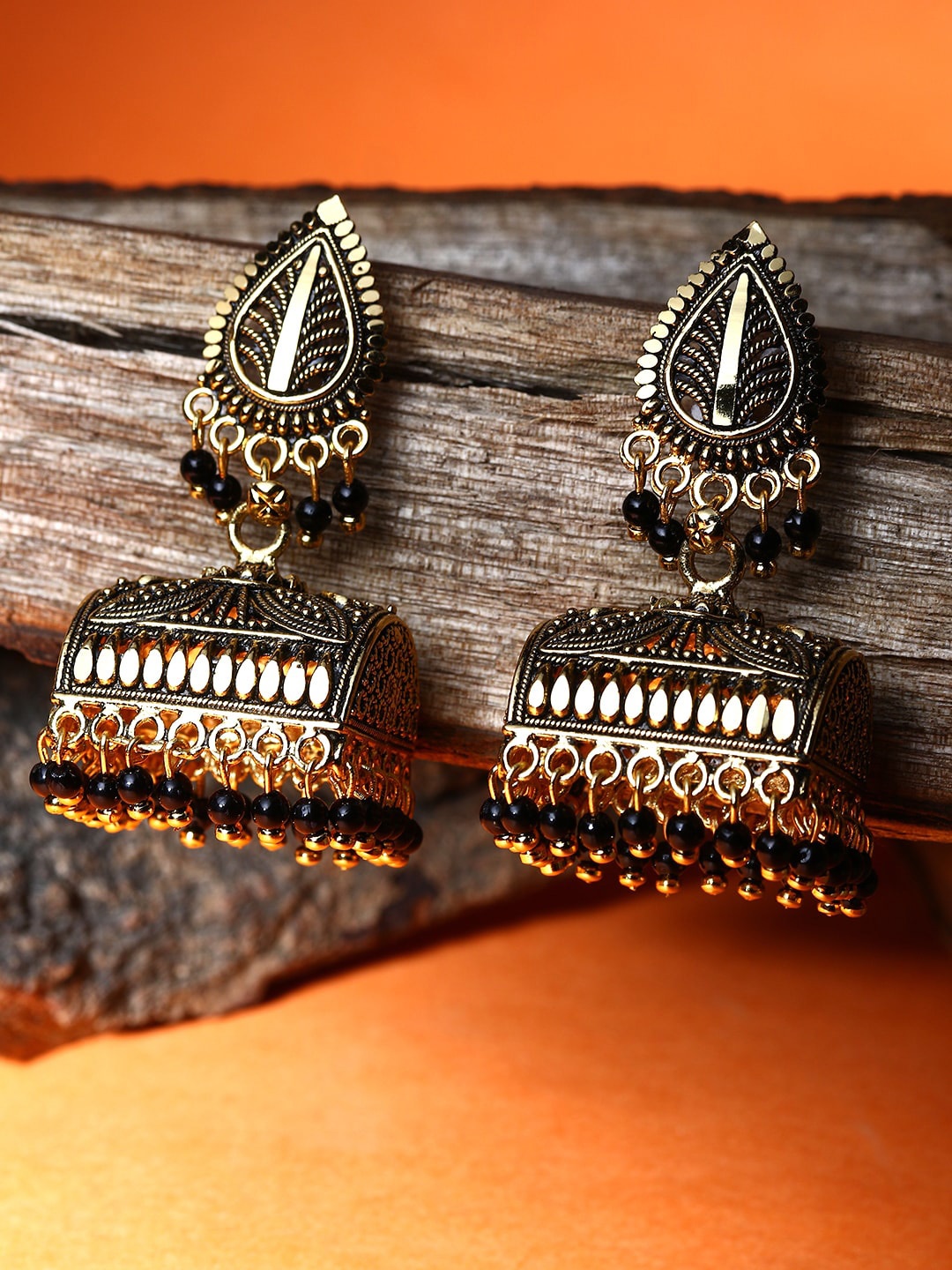 

ANIKAS CREATION Gold-Plated Leaf Shaped Jhumkas