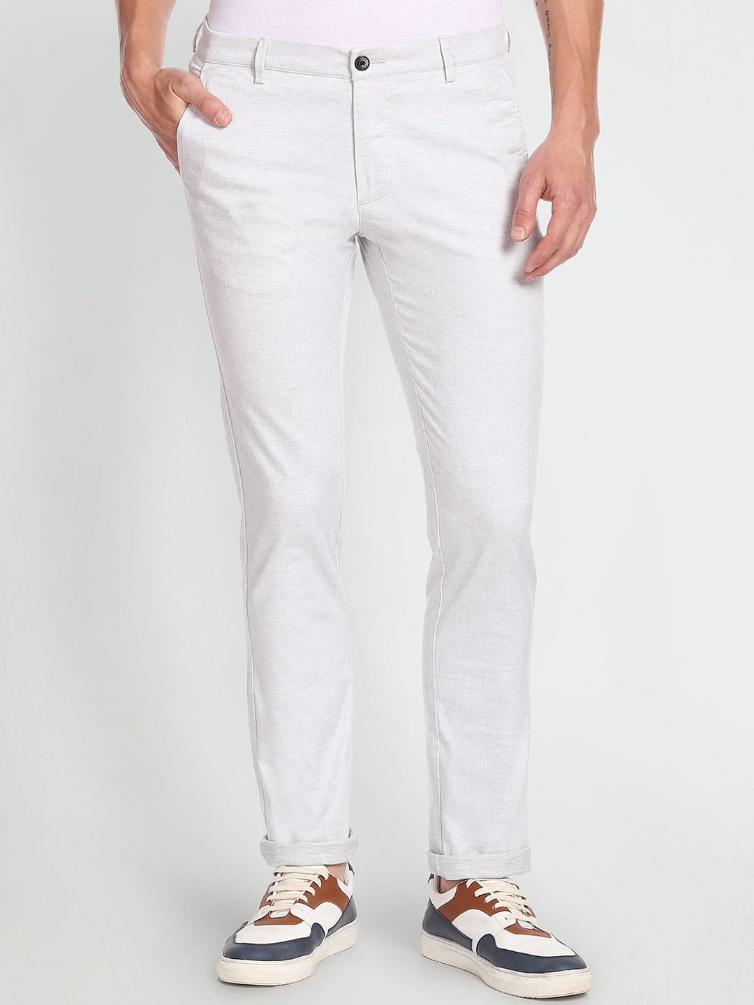 

Arrow Sport Men Slim Fit Smart Flex Mid-Rise Chinos, Grey melange