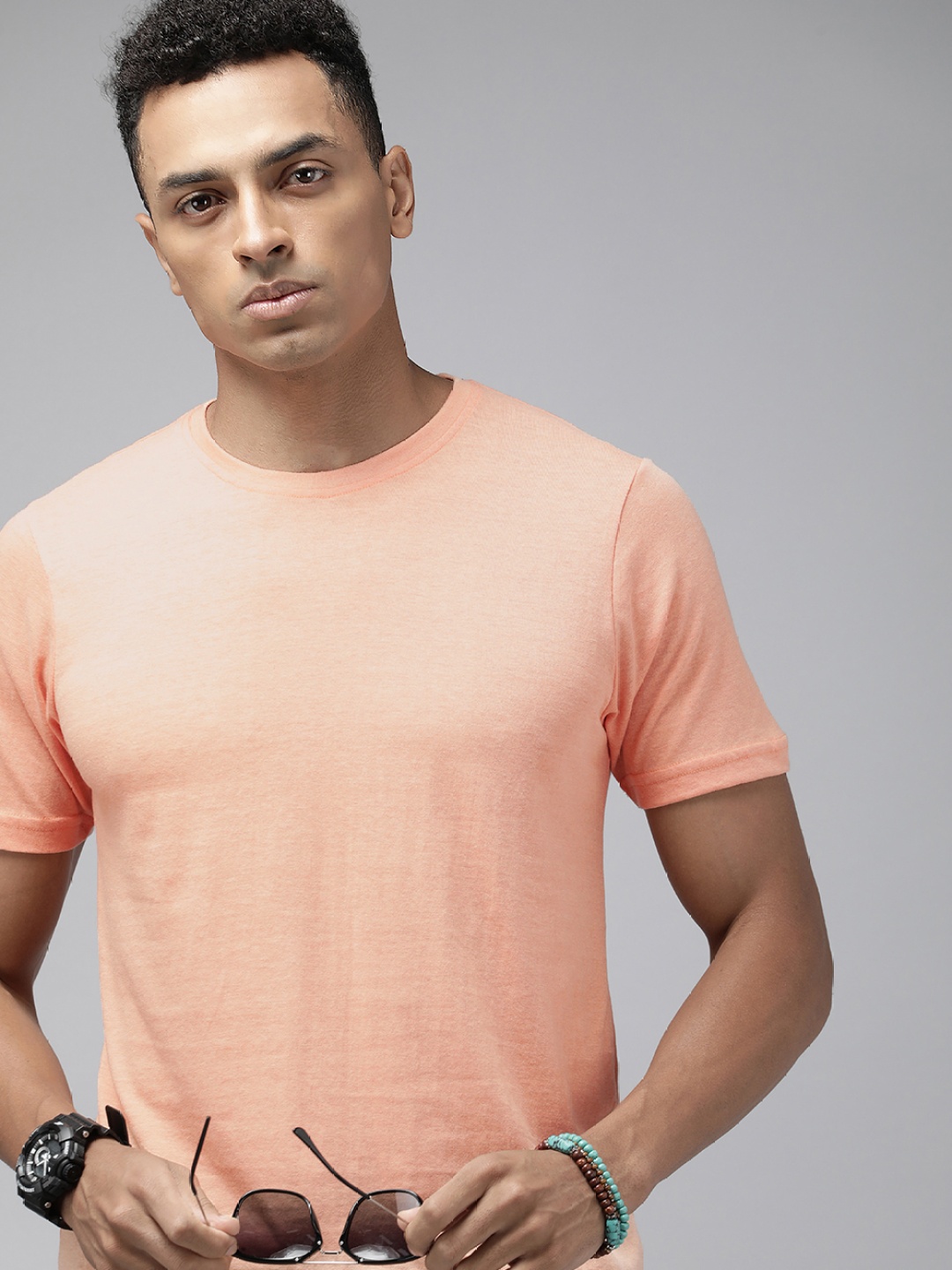 

Roadster Men Solid T-shirt, Orange