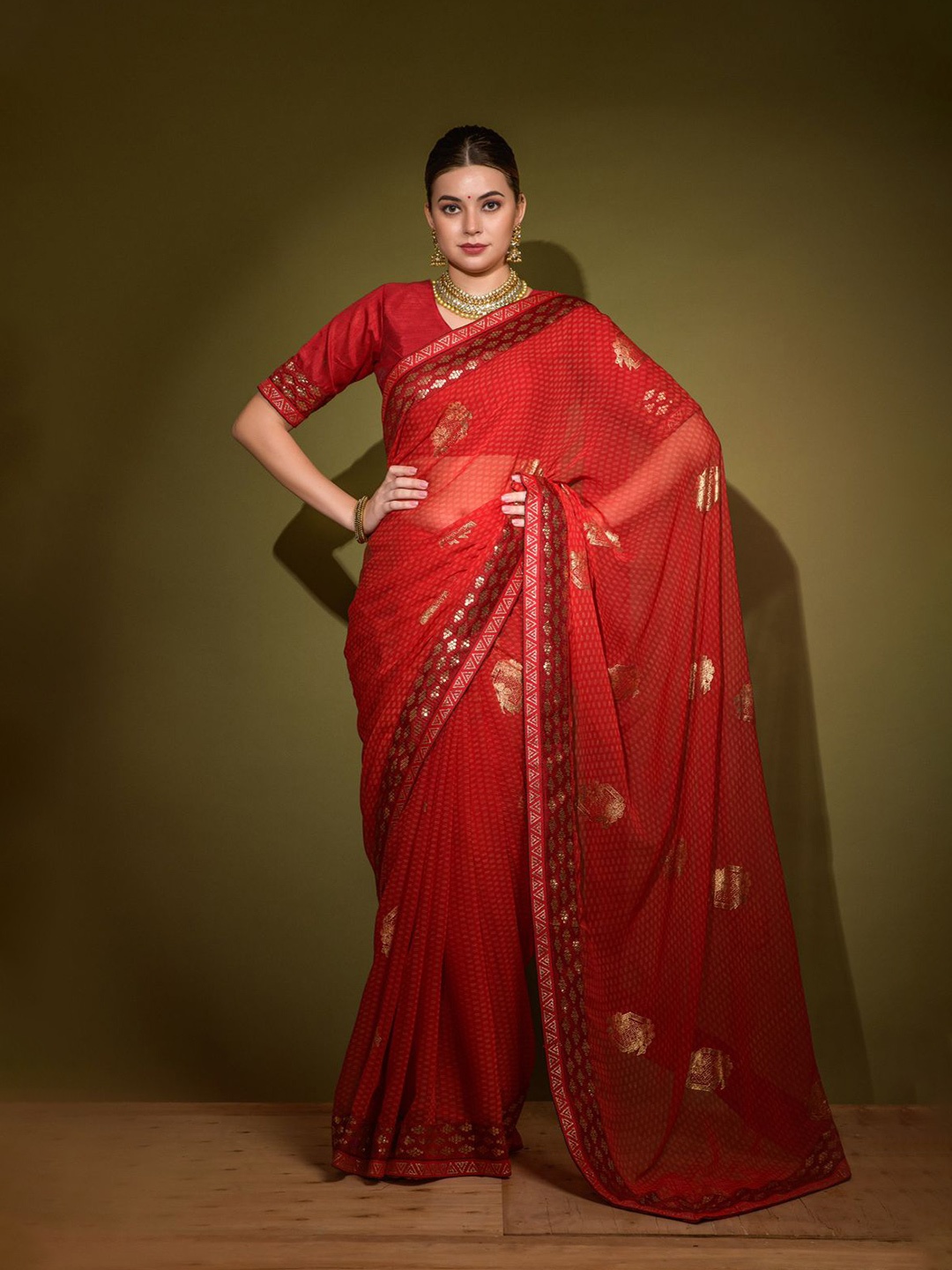 

VEERAX Ethnic Motifs Sequinned Pure Georgette Saree, Red