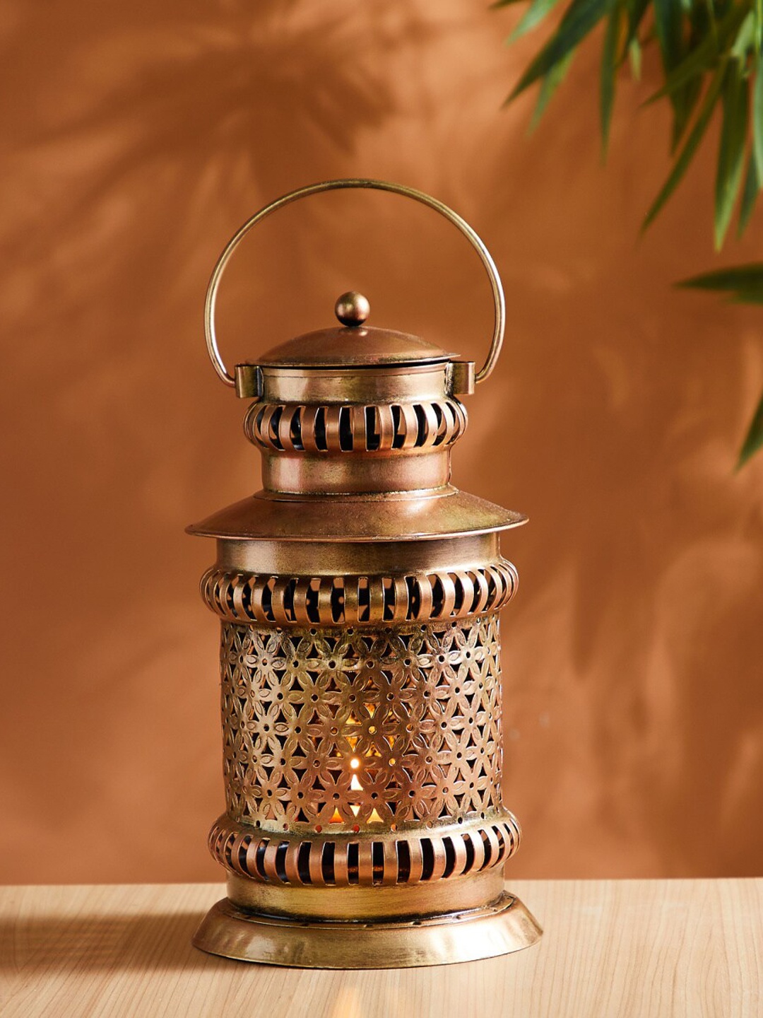 

Home Centre Corsica Mystic India Gold Toned Hanging Lantern Candle Holders, Beige