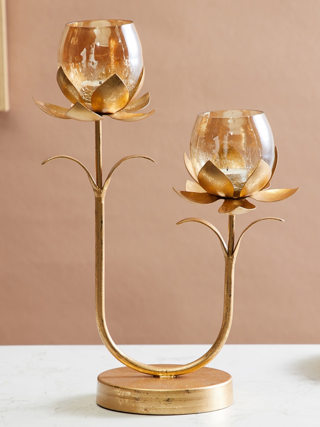 

Home Centre Corsica Gold Toned Textured T-Light Candle Holder