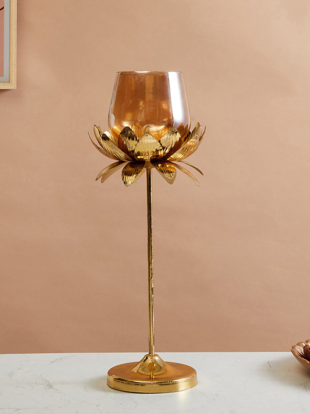 

Home Centre Rylee Gold Toned Lotus Pedestal T-Light Candle Holder