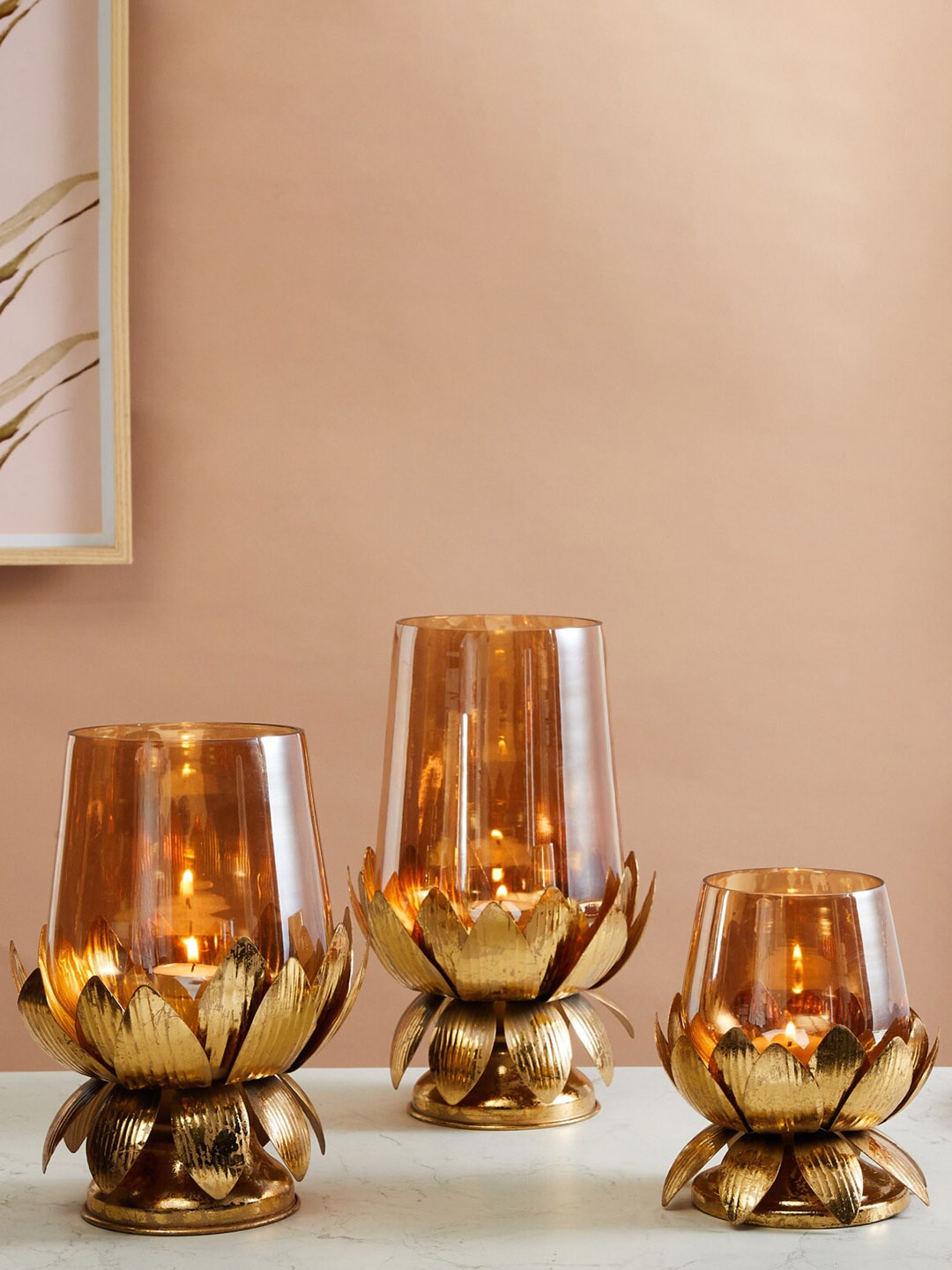 

Home Centre Yellow Textured Glass Hurricane With Metal Stand Lotus T-Light Candle Holder, Gold