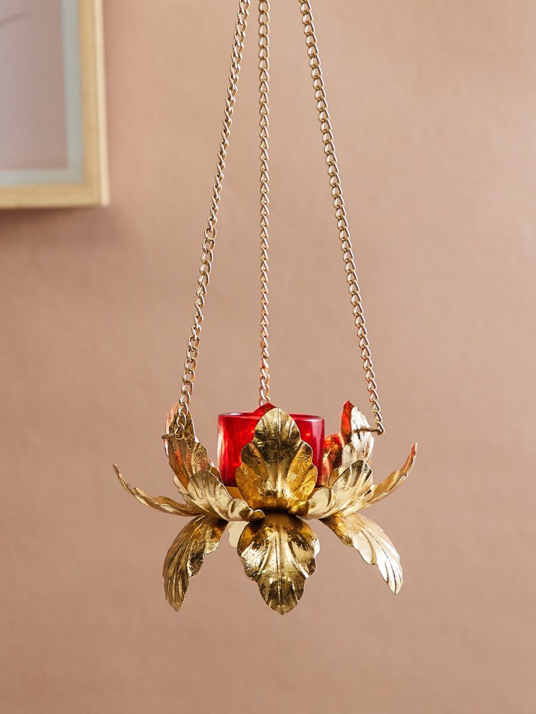 

Home Centre Gold Toned & Red Textured Lotus Hanging T-Light Candle Holder