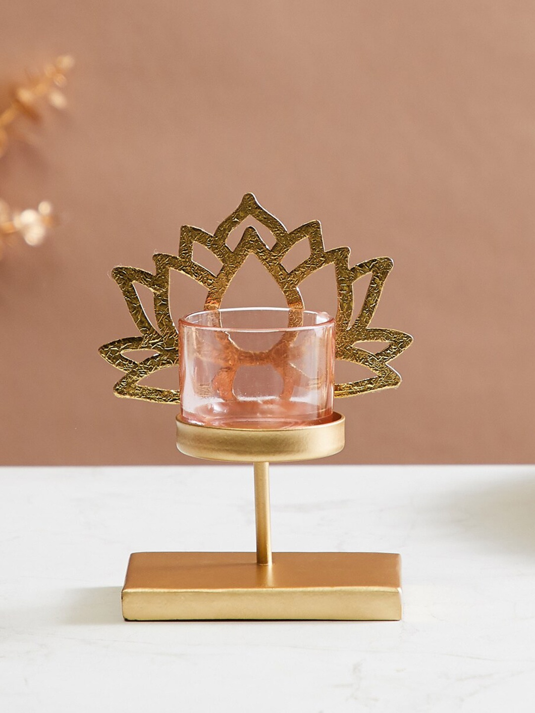 

Home Centre Gold Toned Lotus T-Light Candle Holder