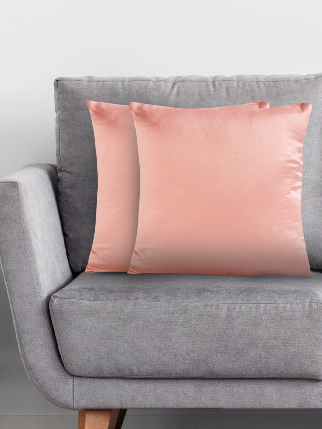 

Home Centre 2 Pieces Peach-Coloured Square Cushion Covers