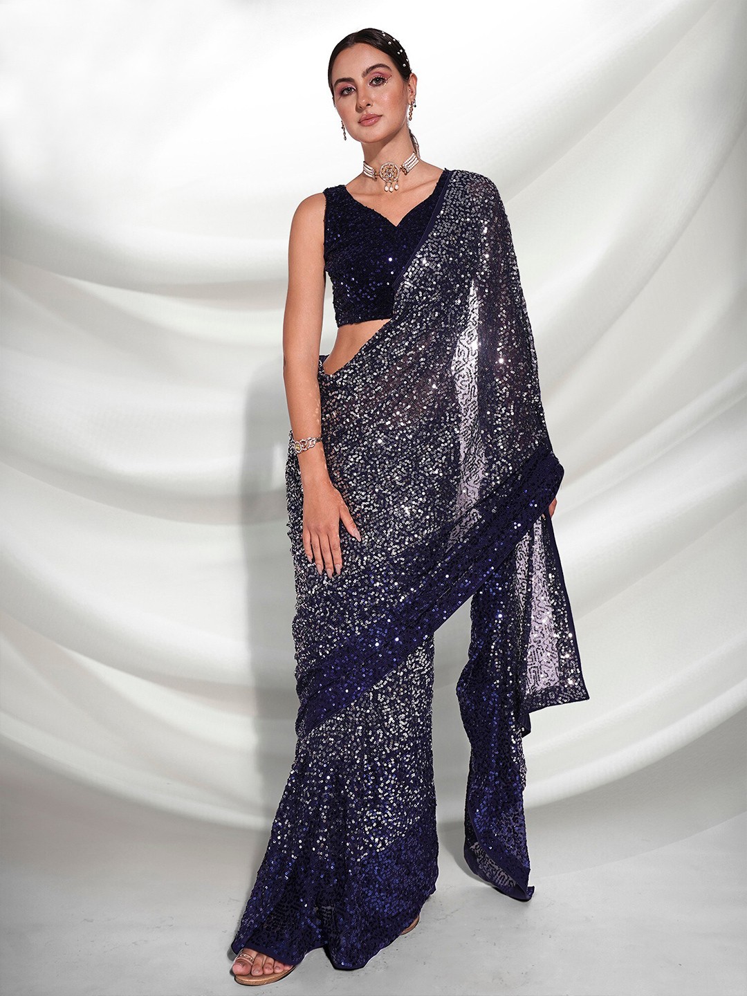 

Mitera Navy Blue Embellished Sequinned Pure Georgette Saree