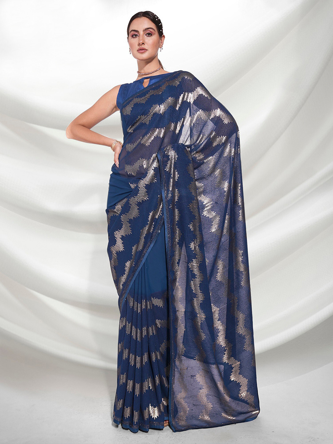 

Mitera Blue & Silver-Toned Embellished Sequinned Pure Georgette Saree