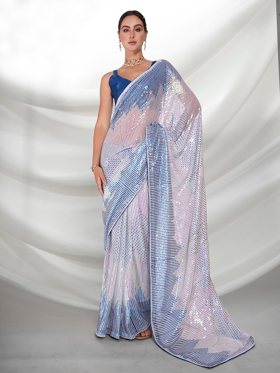 

Mitera Blue Embellished Sequinned Pure Georgette Saree