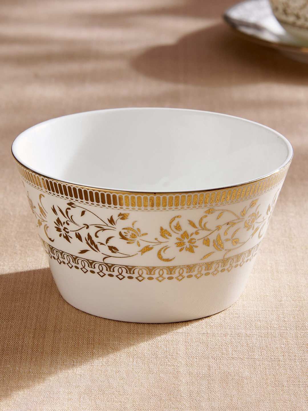 

Home Centre Midas White & Gold Toned Printed Bone China Serving Bowl - 470ml