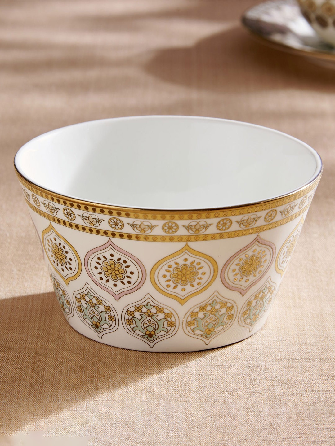 

Home Centre Midas White & Gold-Toned Ethnic Motif Printed Bone China Serving Bowl-470 ml