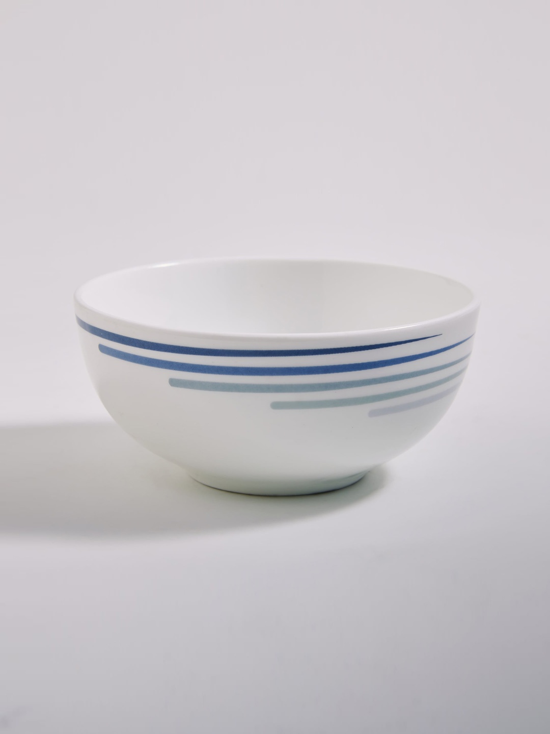 

Home Centre Lucas White & Blue Striped Bone China Serving Bowl-240ml