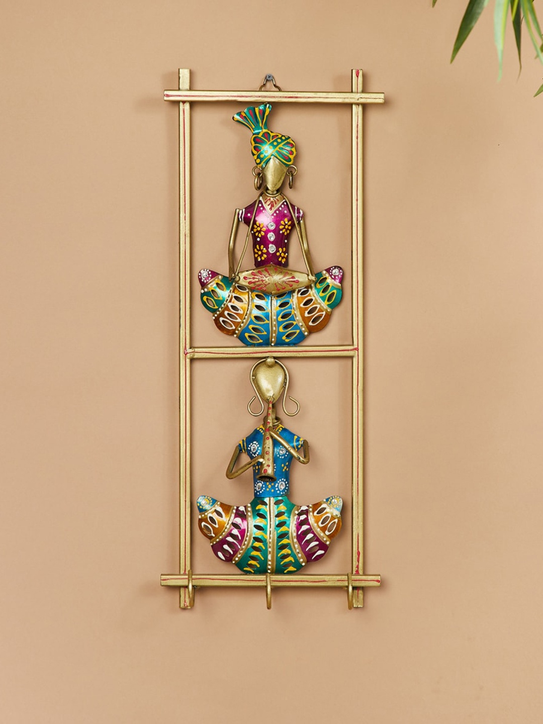 

Home Centre Blue & Red Corsica Mystic India Wrought Iron Musical Doll Wall Art