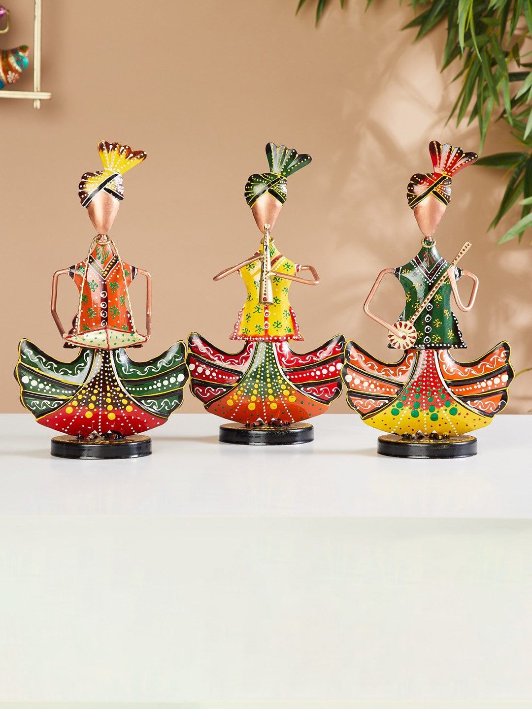 

Home Centre Green 3-Pieces Printed Rajasthani Musicians Figurines Showpieces